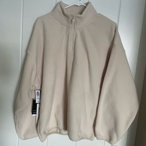 Aritzia TNA polar 1/4 zip! New with tags!